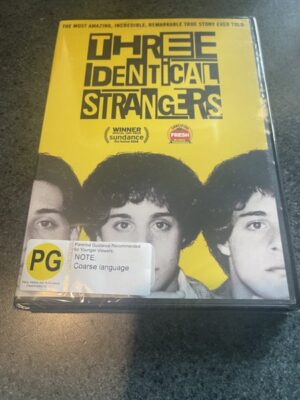 Three Identical Strangers